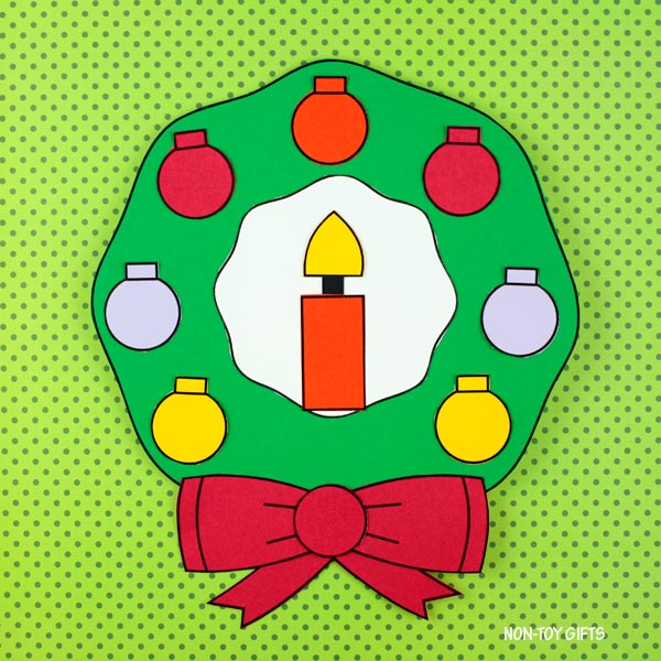 Printable Christmas wreath craft for kids with candle, bow, and decorations template