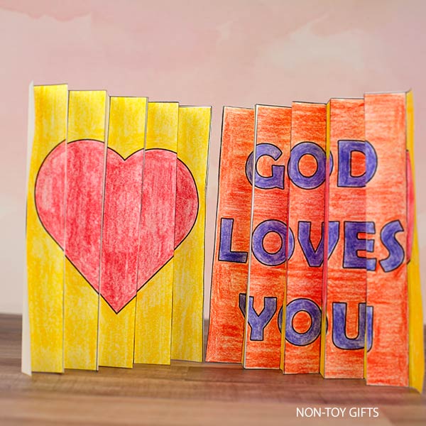 Printable God Loves You Agamograph craft for kids featuring foldable paper art with two hidden Christian messages, perfect for Sunday School, Valentine’s Day, or back-to-school faith activities.