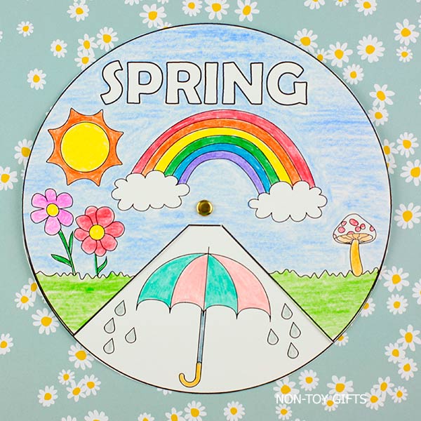 Kids spring craft spinner printable showing umbrella